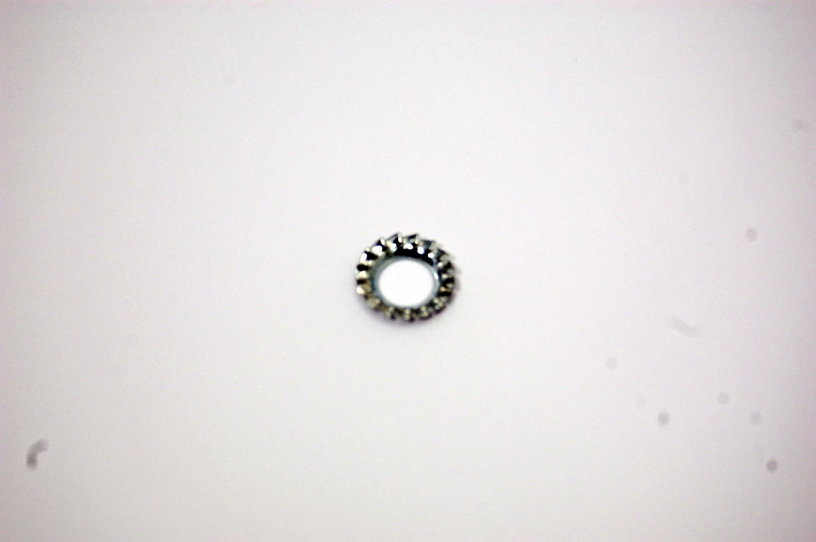 Triumph serated washer for oil pump